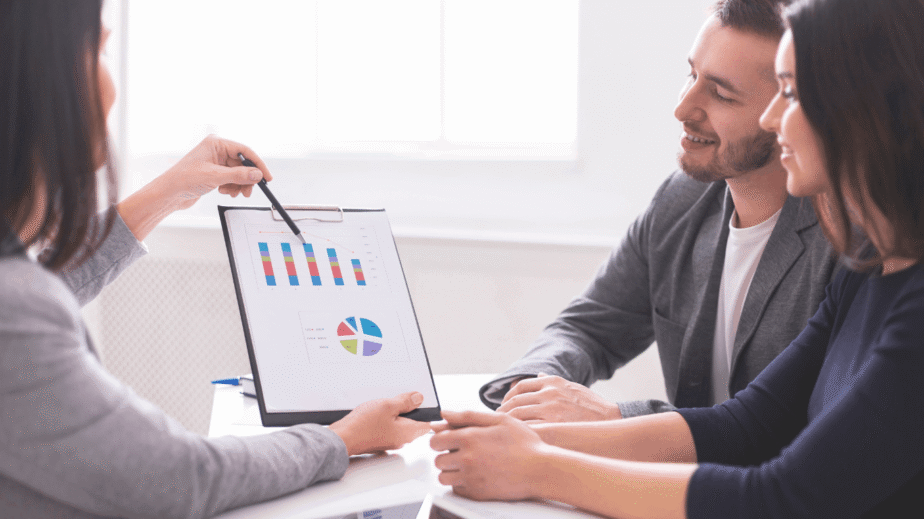 couple working with a financial advisor