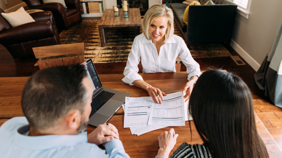 couple asking a financial advisor questions